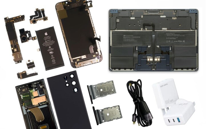 Disassembled smartphone parts including screen, motherboard, battery, and charging cable on a white background.
