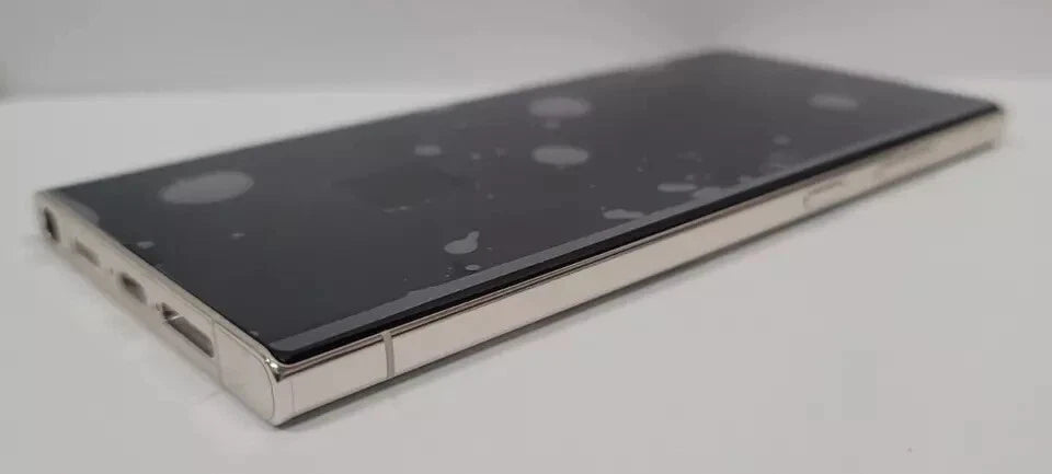 s23 ultra with silver frame  on table